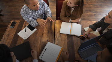 Students at a table talking