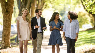 group of students walking and talking