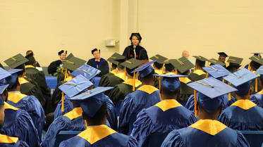 Dr. Tierney Fairchild speaking at Darden PREP graduation.