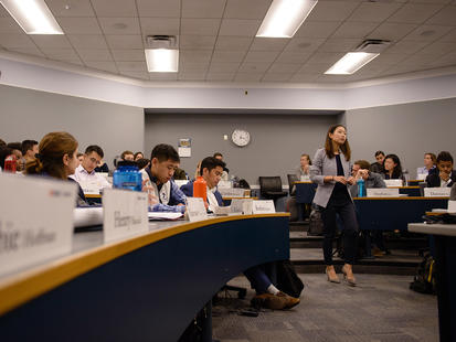 Students in classroom with Professor Tami Kim