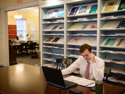 student in Camp Library