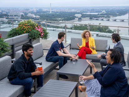 Students talking on the roof
