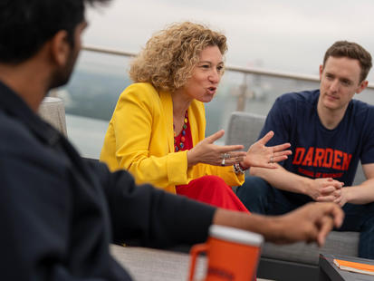 students talking with Yael