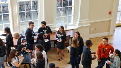 Birdseye view of students talking during First Coffee