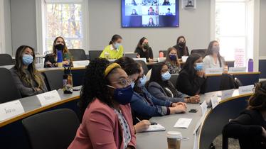 women in a classroom during the graduate women in business conference