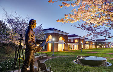 Statue of Thomas Jefferson overlooking Darden grounds