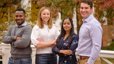 Students standing in front of Darden