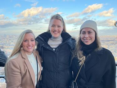 Sarah Boschung, Elizabeth Bianchi, and Catherine Dry at the top of the Eiffel Tower