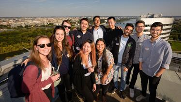 students standing on a rooftop